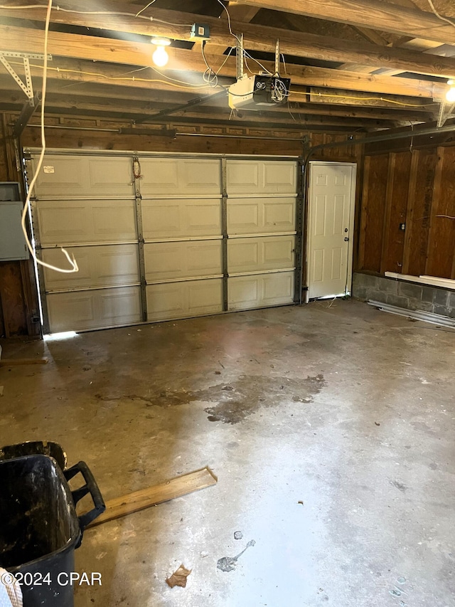 garage featuring a garage door opener