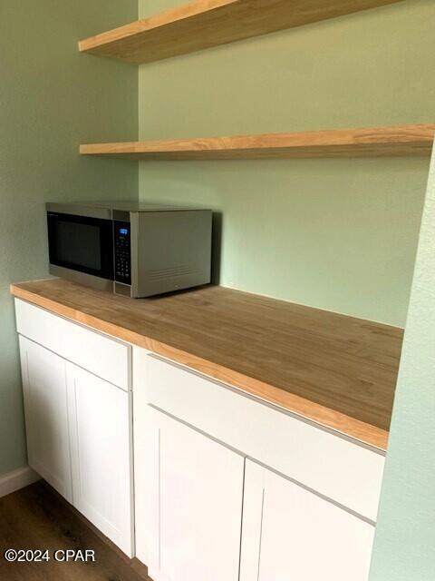 kitchen featuring white cabinetry