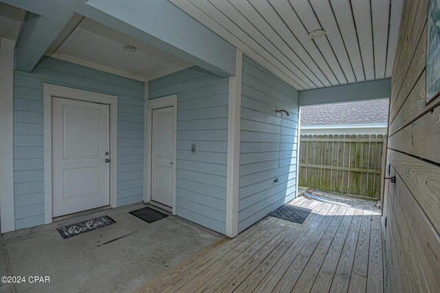 property entrance with a deck