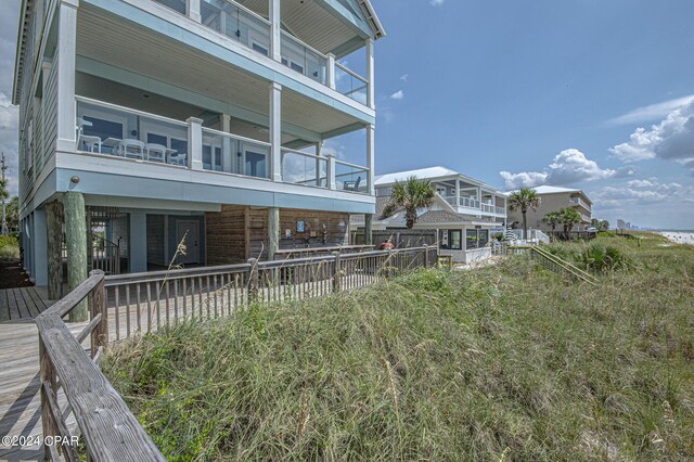 rear view of property with a balcony