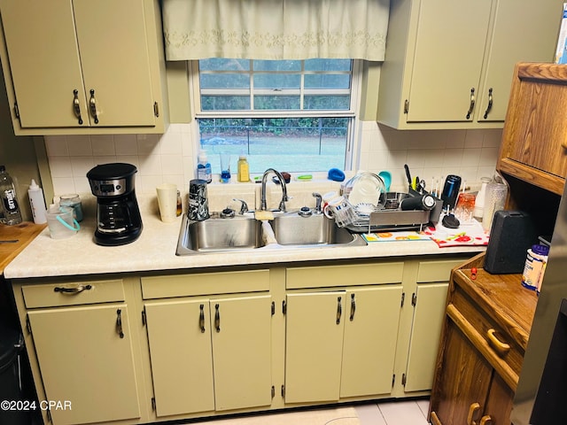 kitchen with sink and backsplash