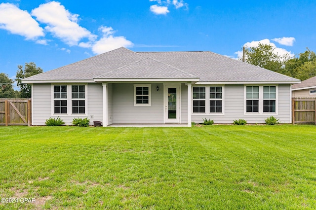 view of front of home with a front lawn