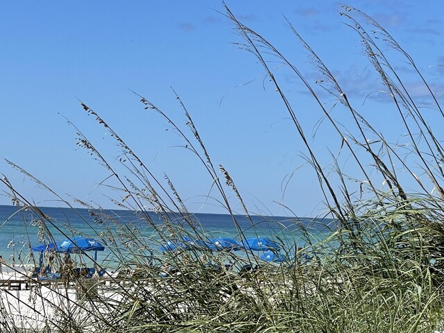 exterior space featuring a beach view