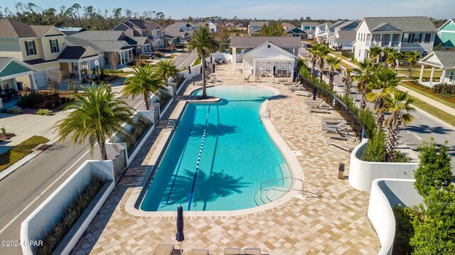 view of pool featuring a patio