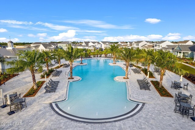 view of pool featuring a patio area