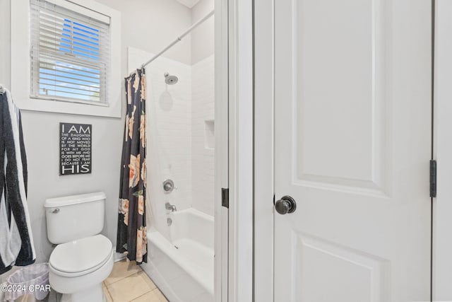 bathroom with toilet, tile patterned floors, and shower / bathtub combination with curtain