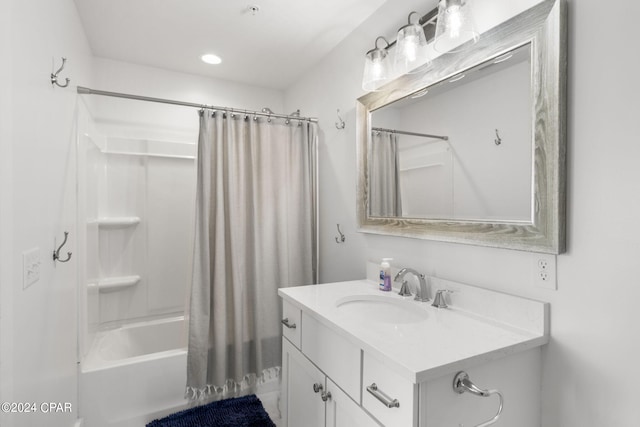 bathroom featuring vanity and shower / bath combo