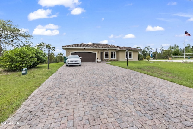 view of front of house with a front yard, a garage, and volleyball court