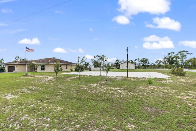 view of yard with a garage