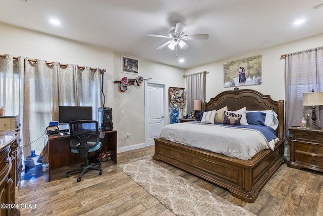 bedroom featuring ceiling fan and light hardwood / wood-style floors