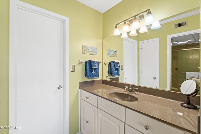 bathroom with vanity and walk in shower