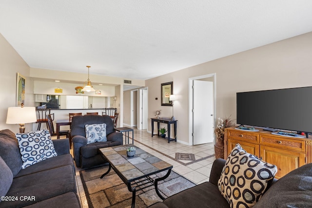 living room featuring light tile patterned floors