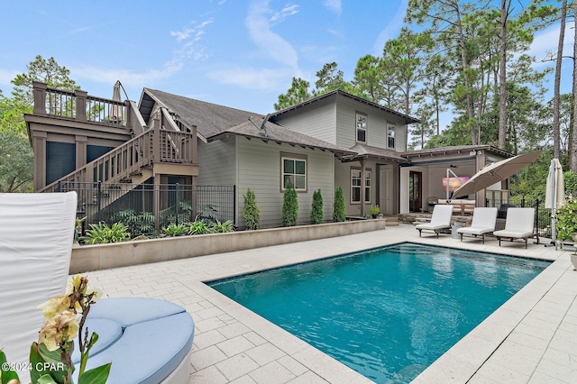 view of pool featuring a patio