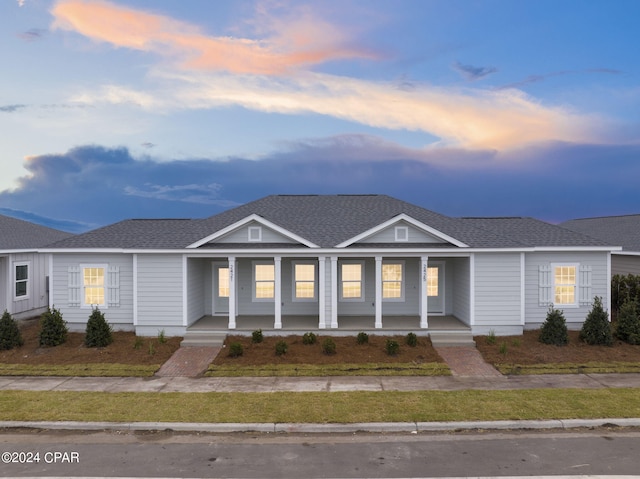 ranch-style house with a porch