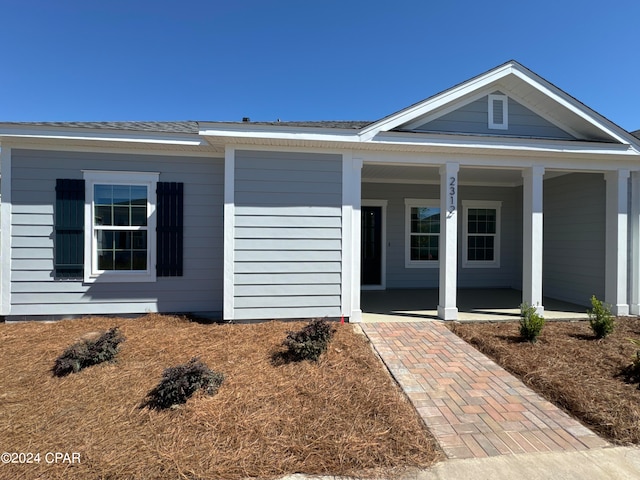 view of front facade featuring covered porch