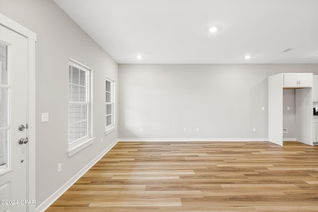 empty room featuring light hardwood / wood-style floors