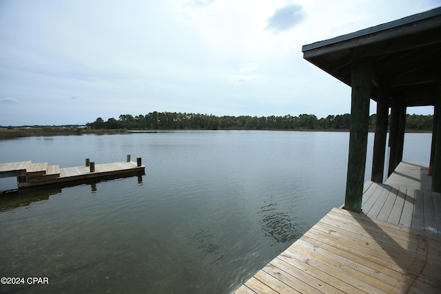 view of dock with a water view