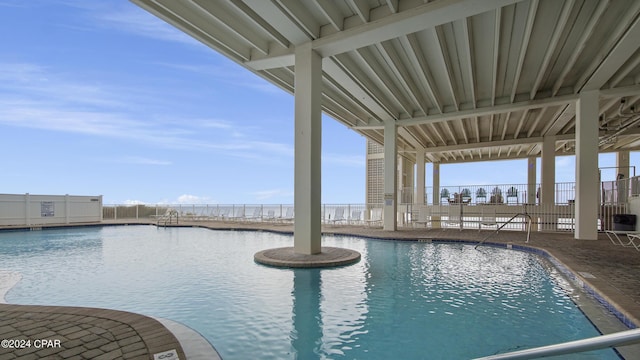 14401 Front Beach Rd Unit 406, Panama City Beach, FL 32413 - pool with fence and a water view