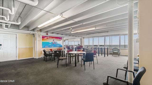 dining space featuring a water view and plenty of natural light