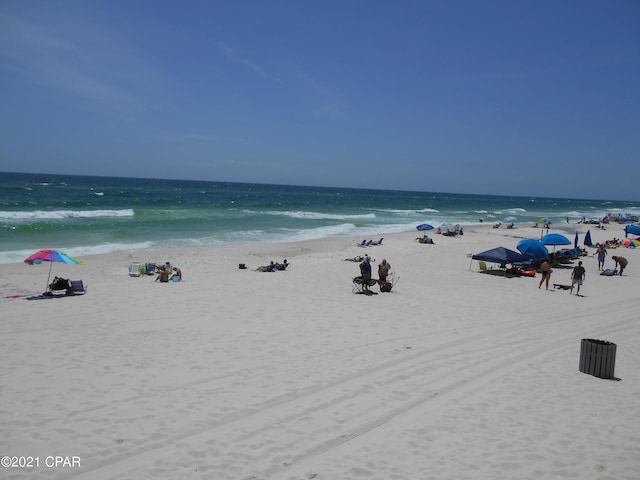 property view of water featuring a beach view