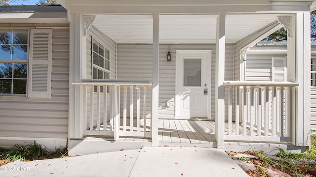 property entrance with covered porch