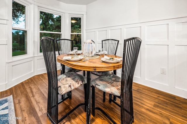 dining room with hardwood / wood-style floors