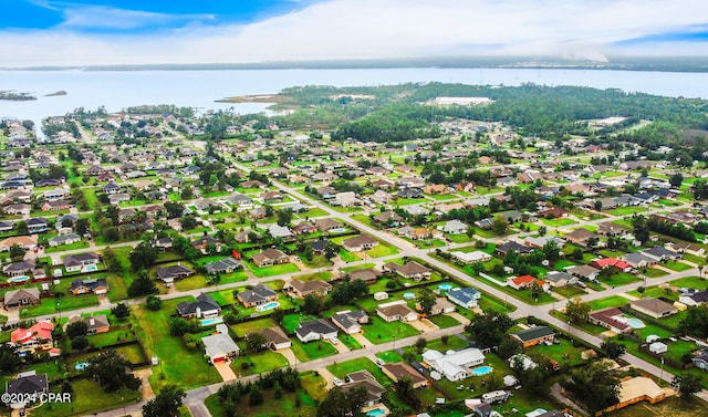 drone / aerial view featuring a water view