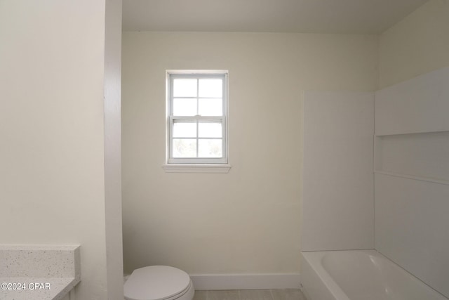 bathroom with tile patterned flooring, vanity, and toilet