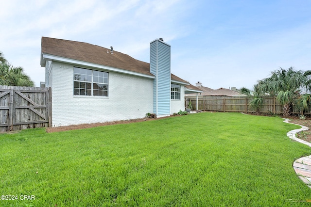 exterior space with a lawn