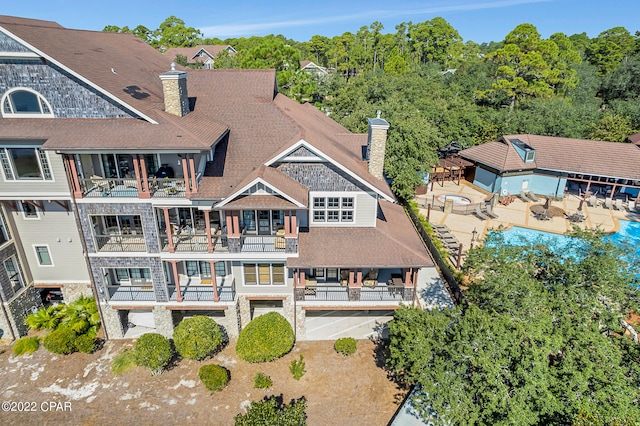 rear view of house with a balcony