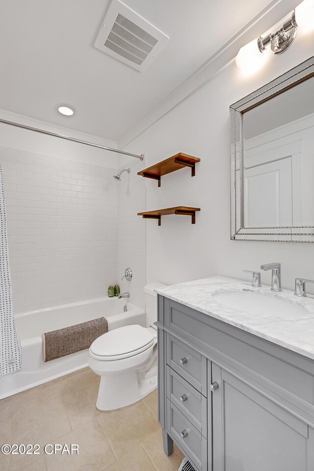 full bathroom with vanity, toilet, tile patterned flooring, and shower / bath combo