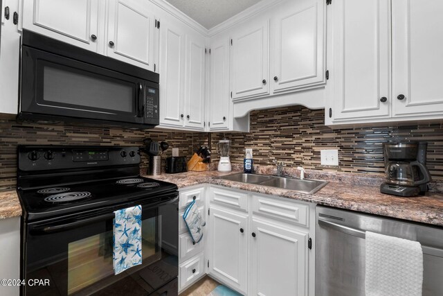 kitchen featuring black appliances, backsplash, crown molding, sink, and white cabinetry