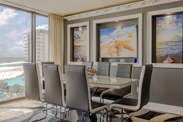 dining area featuring a water view