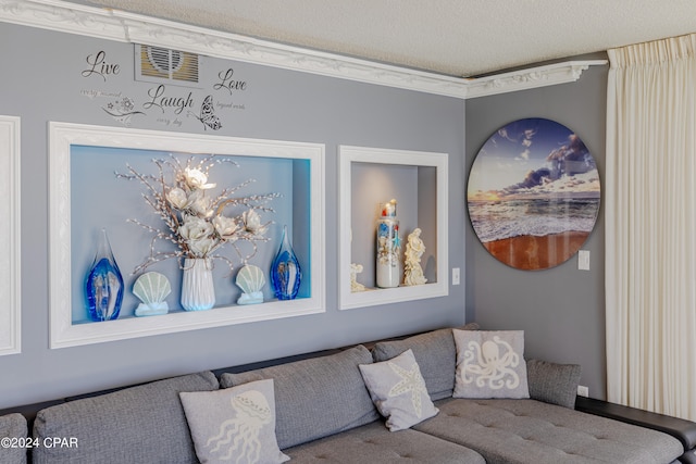 living room with a textured ceiling