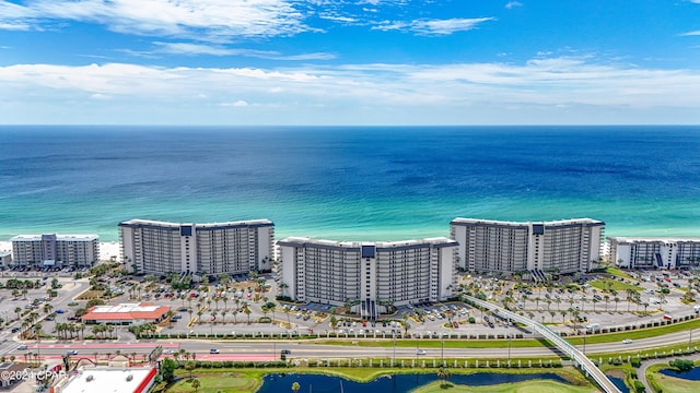 drone / aerial view with a view of city and a water view