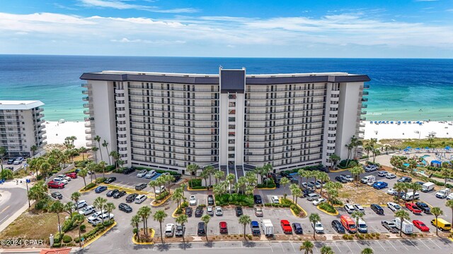 drone / aerial view with a view of the beach and a water view