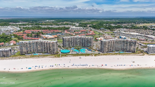 aerial view with a water view, a view of city, and a view of the beach