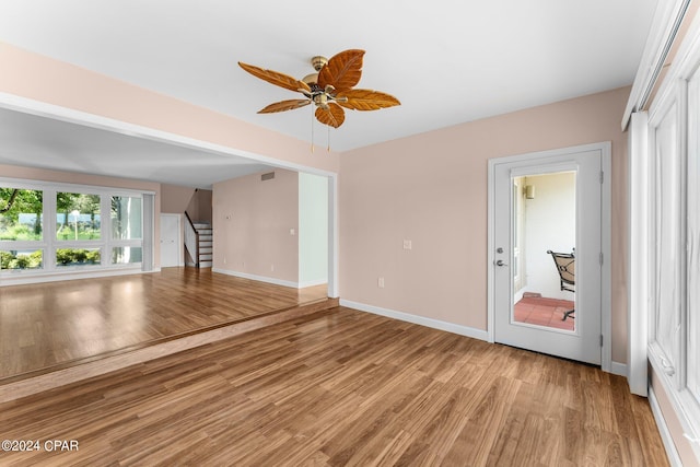 spare room featuring ceiling fan and light hardwood / wood-style floors