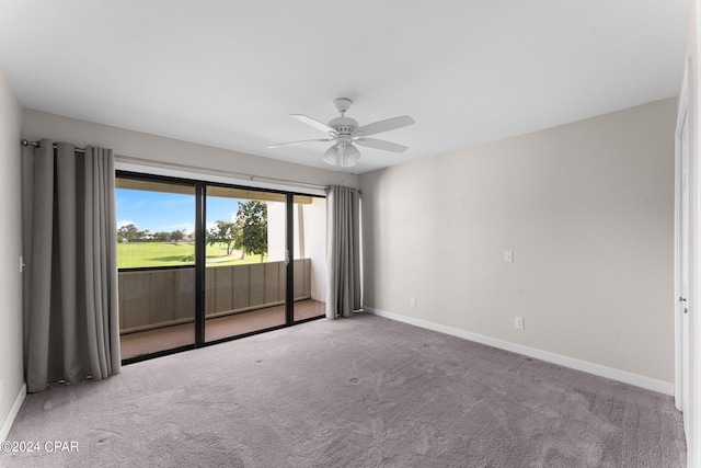 empty room with ceiling fan and carpet