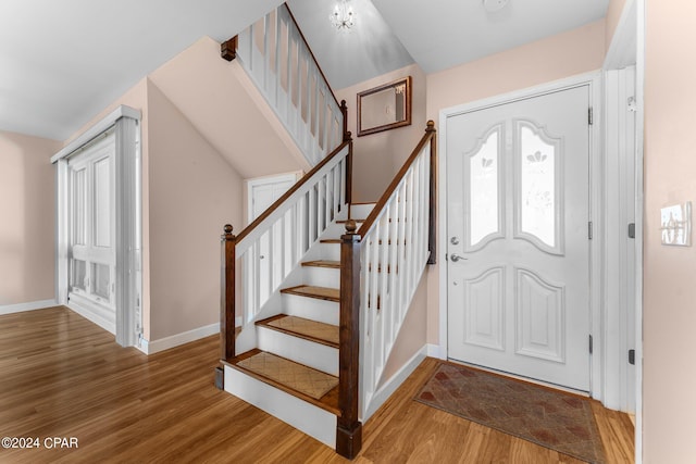 entryway with hardwood / wood-style flooring