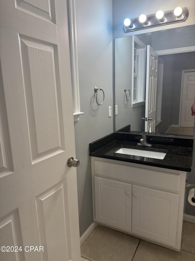 bathroom featuring vanity and tile patterned floors