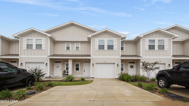 multi unit property featuring a garage