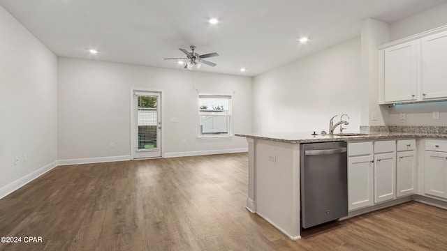 kitchen featuring ceiling fan, sink, white cabinetry, and stainless steel dishwasher