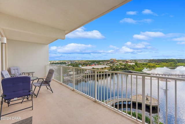 balcony featuring a water view