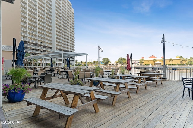 wooden deck with a water view