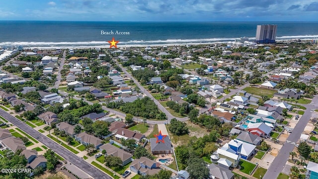 aerial view featuring a water view and a view of the beach