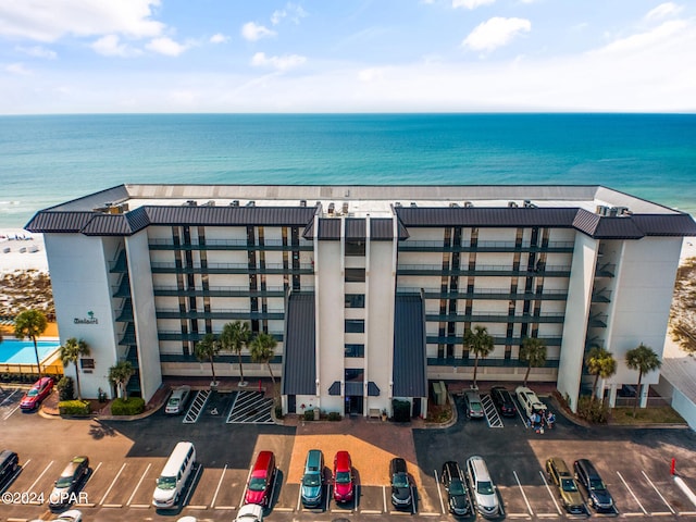 view of building exterior with a water view