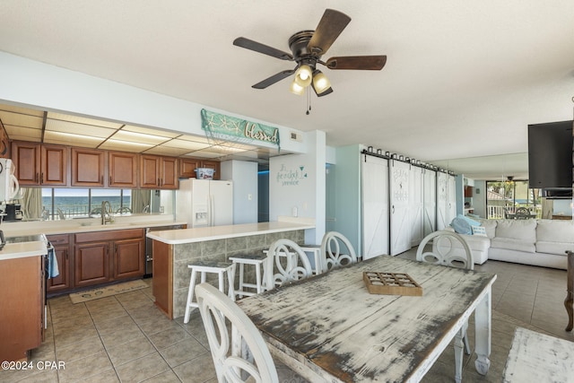11757 Front Beach Rd Unit W108, Panama City Beach, FL 32407 - dining room featuring light tile patterned floors and a ceiling fan