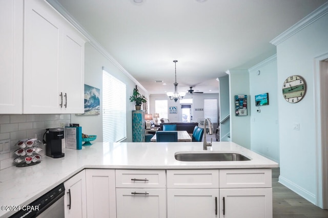 kitchen featuring crown molding, sink, dark wood-type flooring, and white cabinets