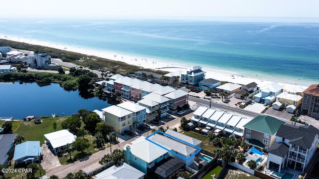 bird's eye view with a view of the beach and a water view